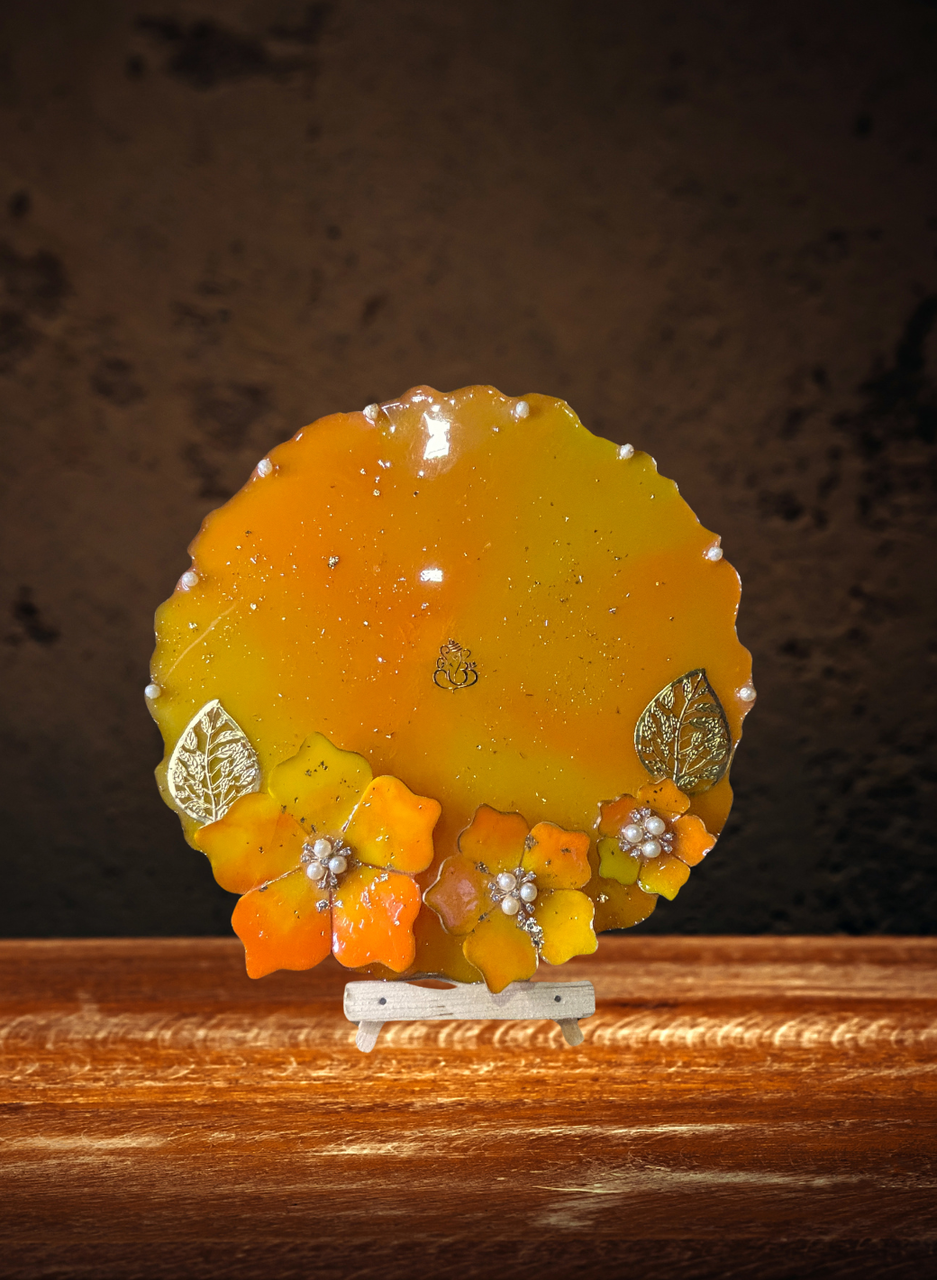 A decorative resin pooja thali